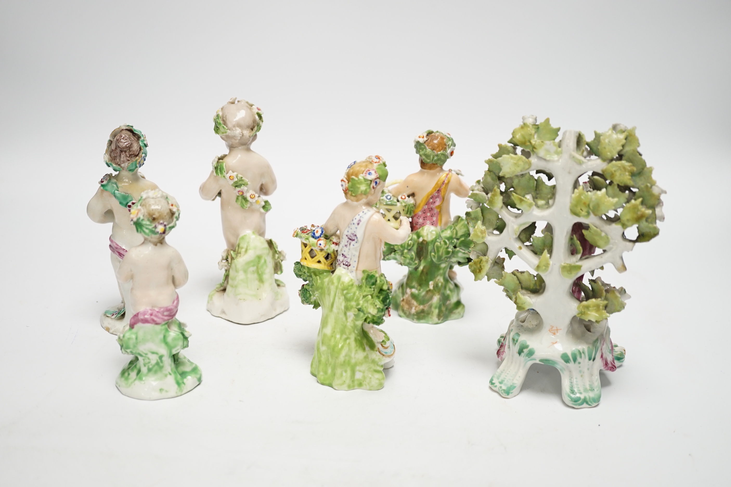 Six 18th/19th century figures by Bow and Derby, including a flower encrusted Bow figure with bocage, 15cm